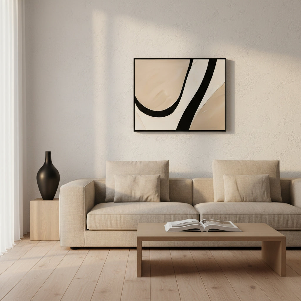 Modern living room with a beige sofa, coffee table, and abstract art on the wall.