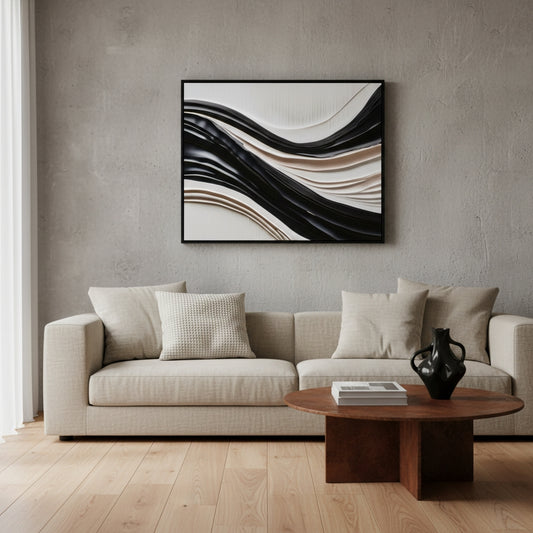 Modern living room with a beige sofa, wooden coffee table, and abstract wall art.