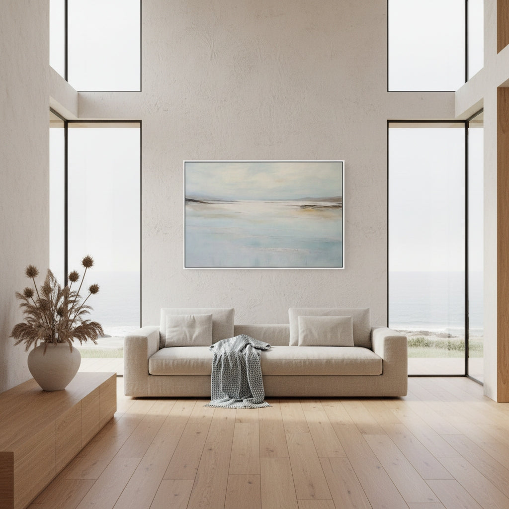 Modern living room with a beige sofa, wooden coffee table, and abstract painting on the wall.