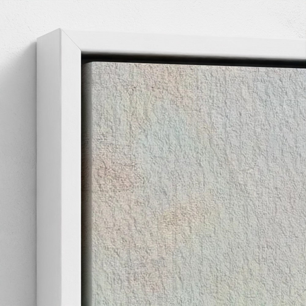 Close-up of a textured wall with a white frame.