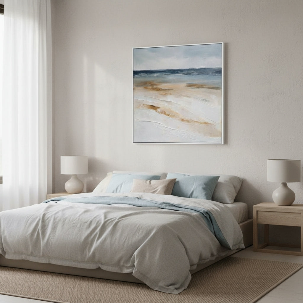 Modern bedroom with a bed, nightstands, and wall art.