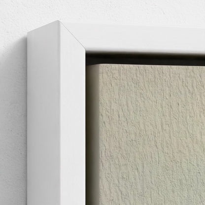 Close-up of a white frame corner on a textured wall.