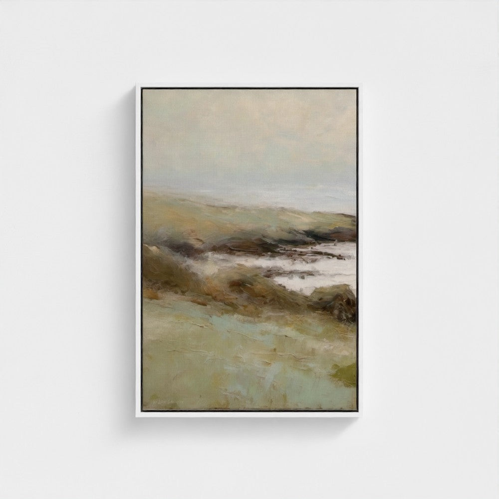 Framed abstract landscape painting on a white wall