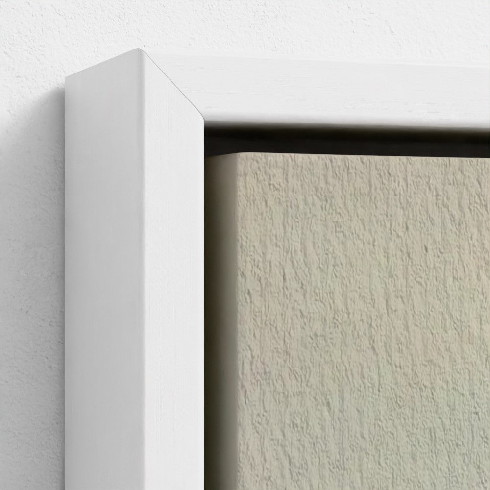 Close-up of a white frame corner on a textured wall.