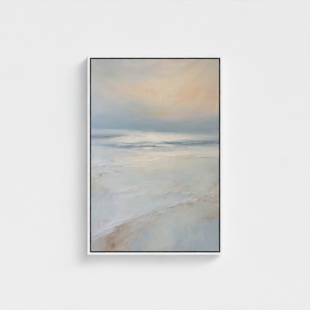 Framed artwork of a beach scene with soft colors on a white background