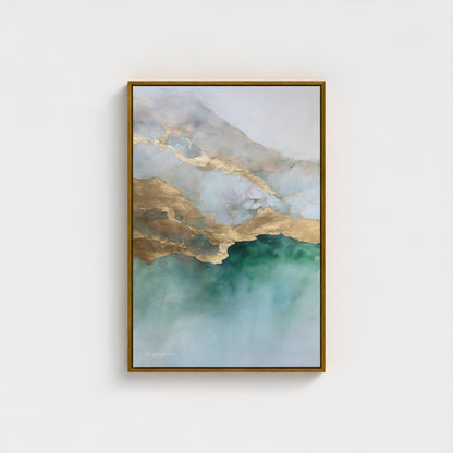 Framed abstract art with gold and green hues on a white wall