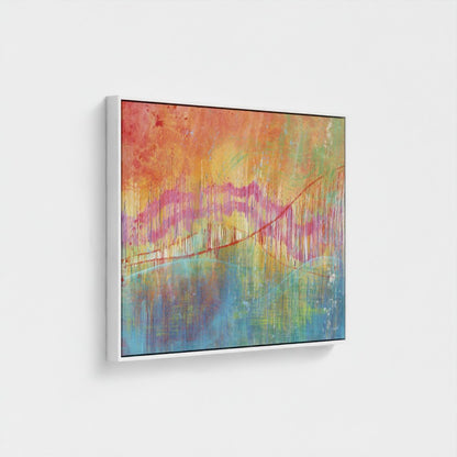Abstract painting with vibrant colors on a white wall