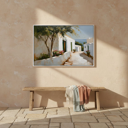 Framed painting of a coastal scene on a beige wall above a wooden bench with cloths.