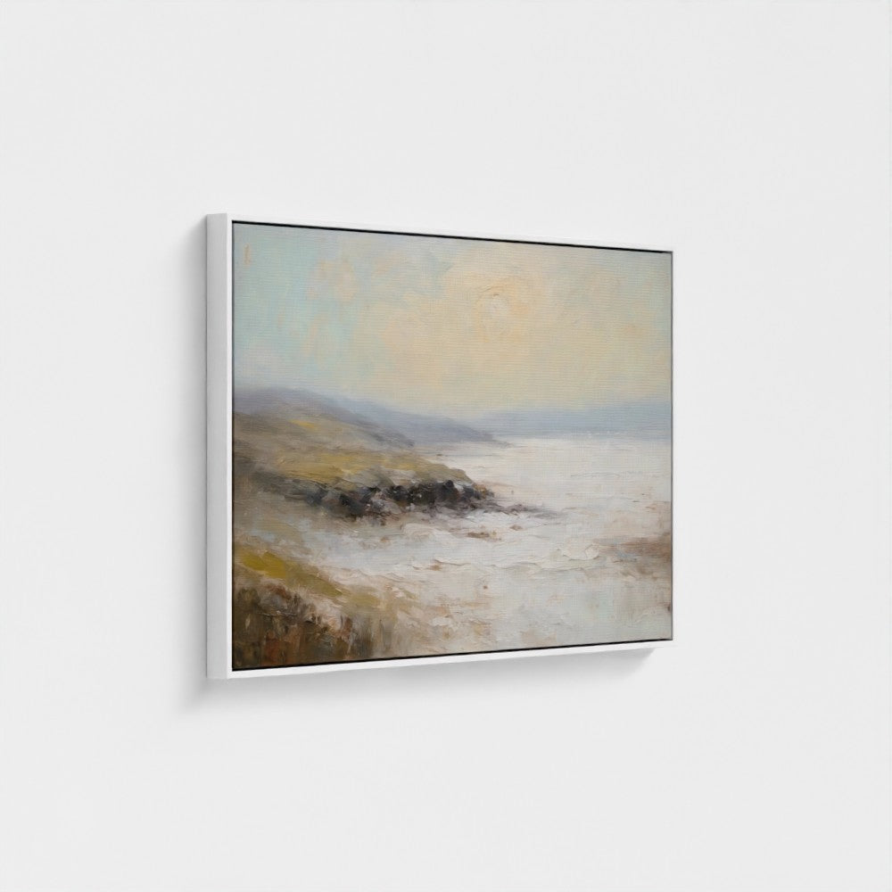 Framed painting of a landscape with a sunset over water on a white wall
