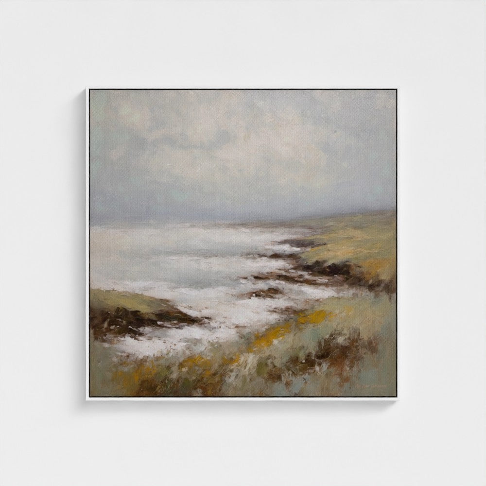 Framed painting of a coastal landscape with waves and sky.