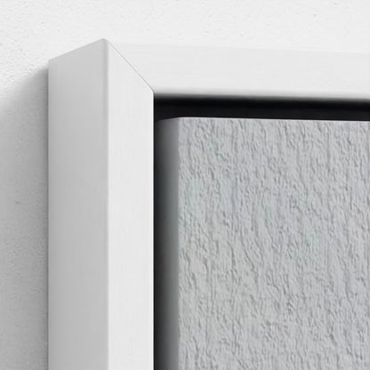 Close-up of a textured white wall with a black frame corner.