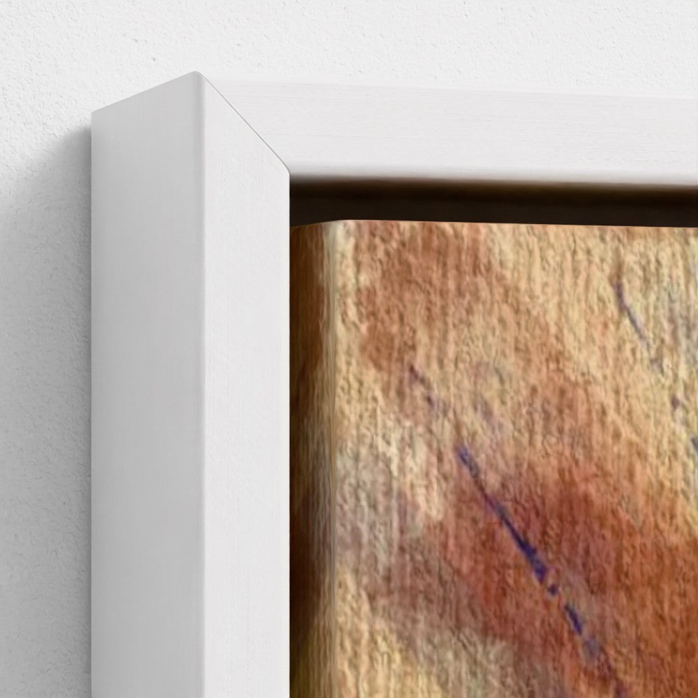 Close-up of a textured wall art piece with a white frame.