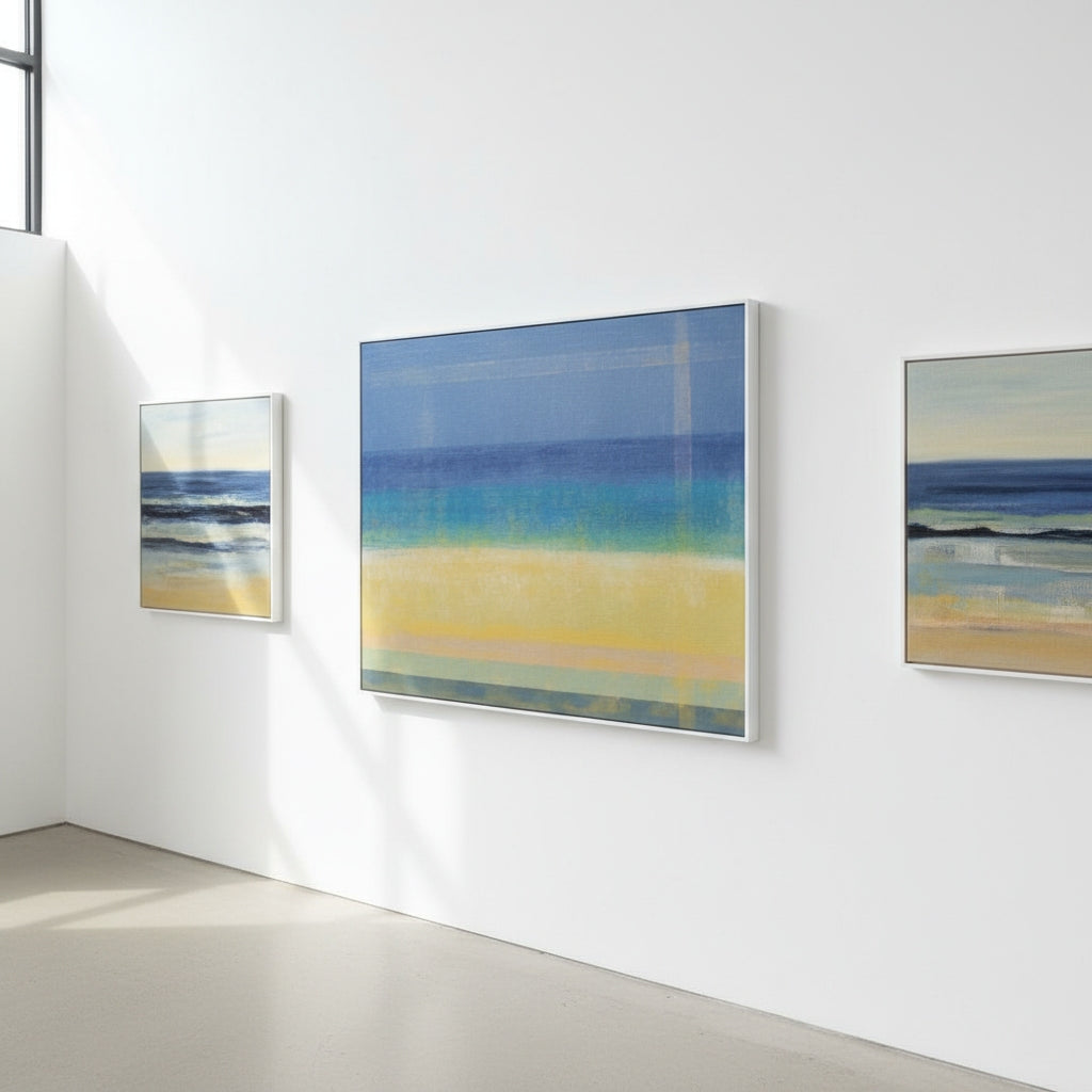 Three abstract paintings on a white wall