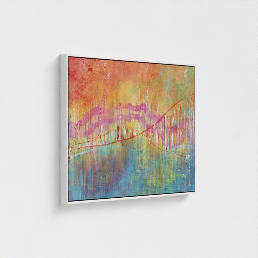Abstract painting with vibrant colors on a white wall