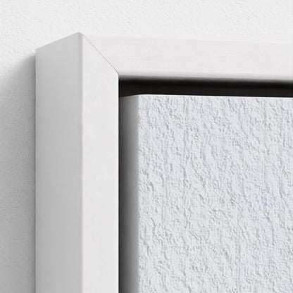 Close-up of a white frame corner on a textured white wall