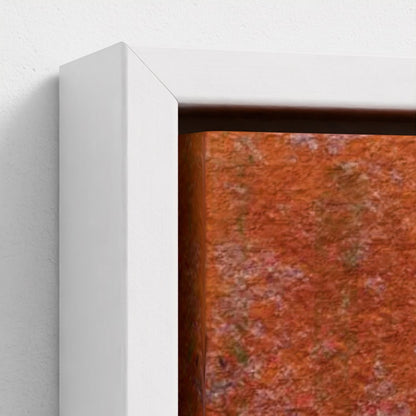 Close-up of a textured red surface with a white frame on a light gray background