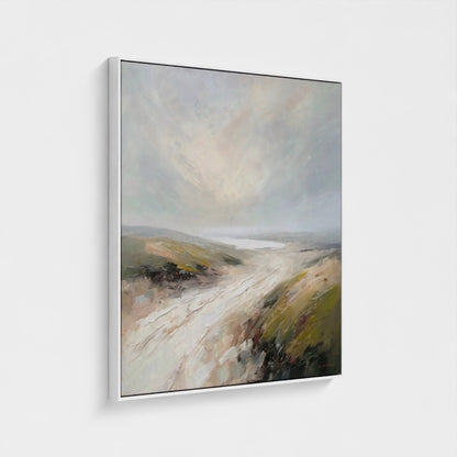 Framed painting of a landscape with a cloudy sky on a white background