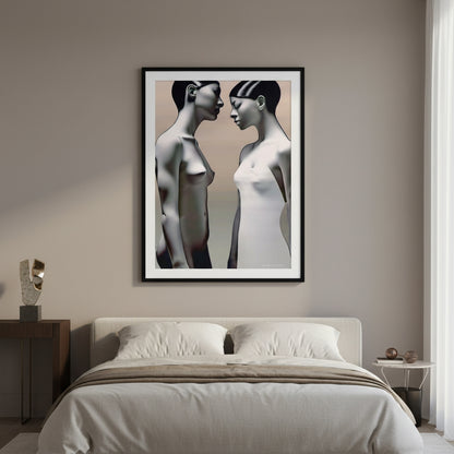 Framed artwork of two abstract figures on a wall above a bed in a bedroom.
