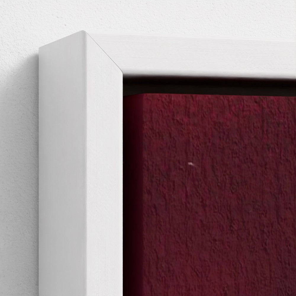 Close-up of a white frame corner with a red background